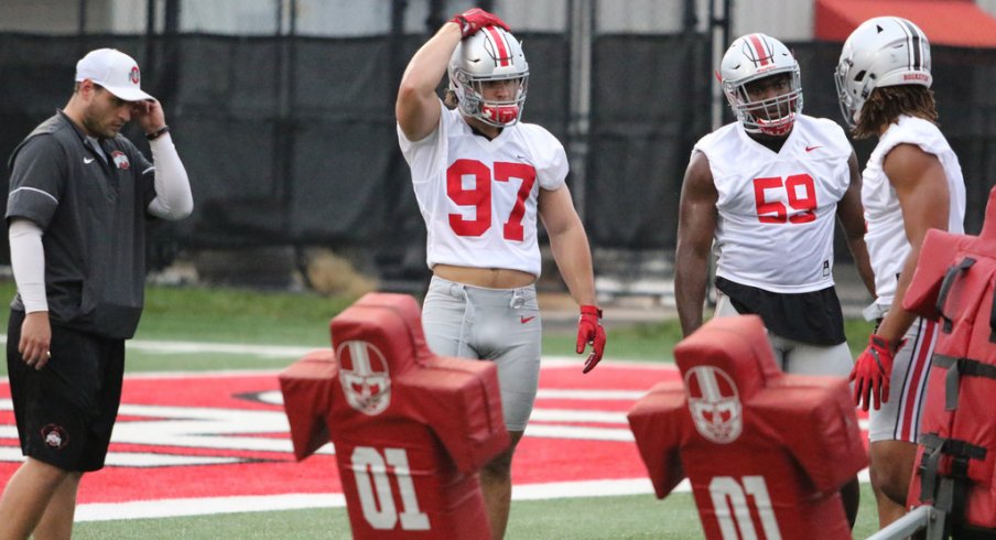Nick Bosa, Tyquan Lewis and Chase Young during Ohio State's first practice. 