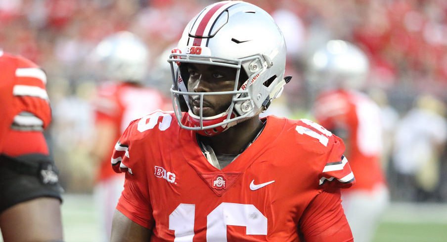 J.T. Barrett broke a Big Ten record after a week of being criticized for his poor play against Oklahoma.