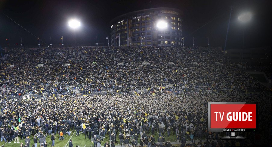 Nov 12, 2016; Iowa City, IA, USA; Fans storm the field after Iowa Hawkeyes place kicker Keith Duncan (not pictured) kicks the game winning field goal against the Michigan Wolverines at Kinnick Stadium. The Hawkeyes won 14-13. Mandatory Credit: Reese Strickland-USA TODAY Sports