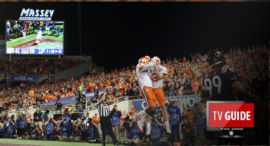 Dec 3, 2016; Orlando, FL, USA; Clemson Tigers wide receiver Hunter Renfrow (13) is congratulated by wide receiver Artavis Scott (3) after he scored a touchdown against the Virginia Tech Hokies during the second half of the ACC Championship college football game at Camping World Stadium. Clemson Tigers defeated the Virginia Tech Hokies 42-35. Mandatory Credit: Kim Klement-USA TODAY Sports