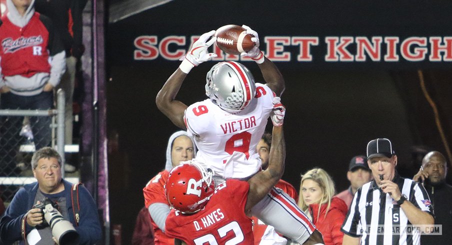 Binjimen Victor Moss'd this Rutgers defender for a touchdown.