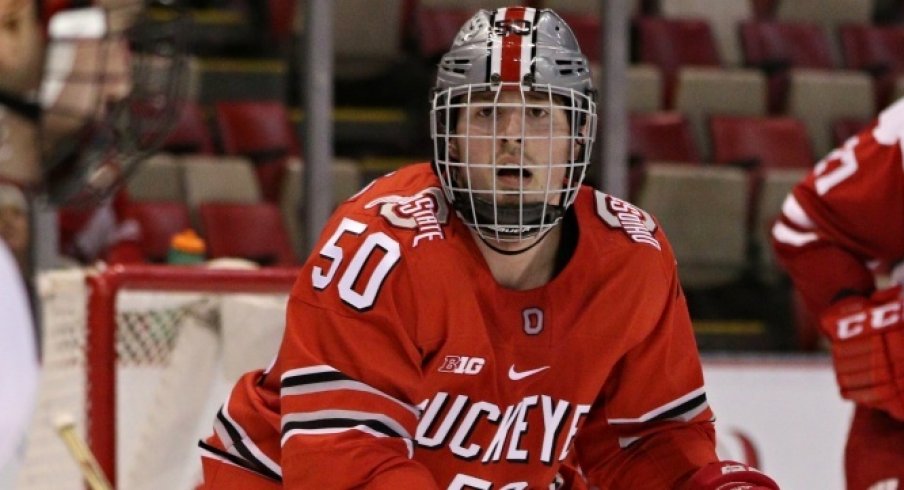 Ohio State's Matt Miller keeps an eye on the Badgers