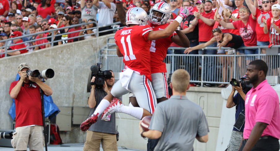 Austin Mack celebrates against Maryland