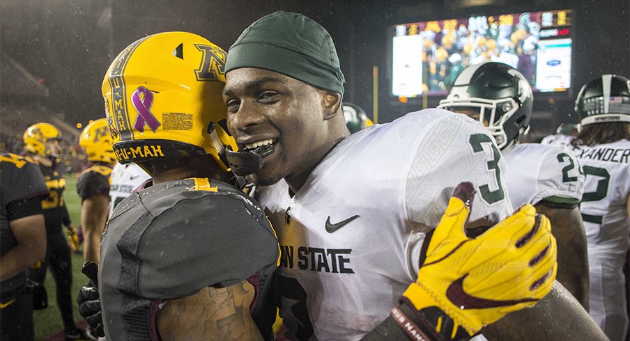 L.J. Scott and the Spartans survived a rainy night in the Twin Cities.