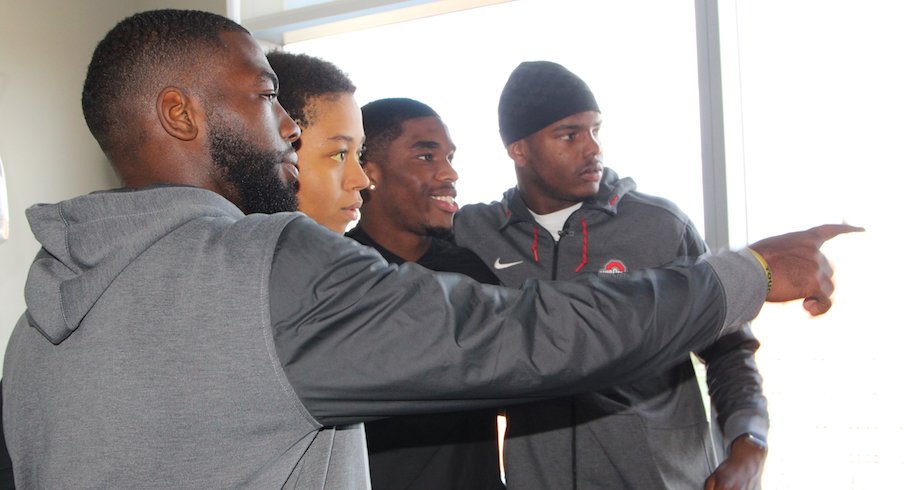 J.T. Barrett, Jeffrey Okudah and Jaylen Harris were among six Ohio State football players who visited the James Cancer Hospital on Monday.