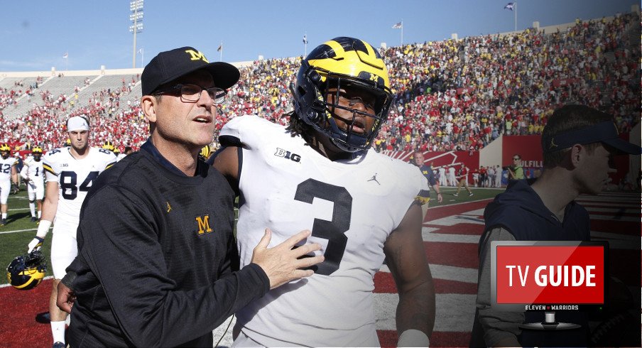 Oct 14, 2017; Bloomington, IN, USA; Michigan Wolverines coach Jim Harbaugh walks off the field with defensive lineman Rashan Gary (3) after the game against the Indiana Hoosiers at Memorial Stadium. Michigan defeats Indiana 27-20 in overtime. Mandatory Credit: Brian Spurlock-USA TODAY Sports