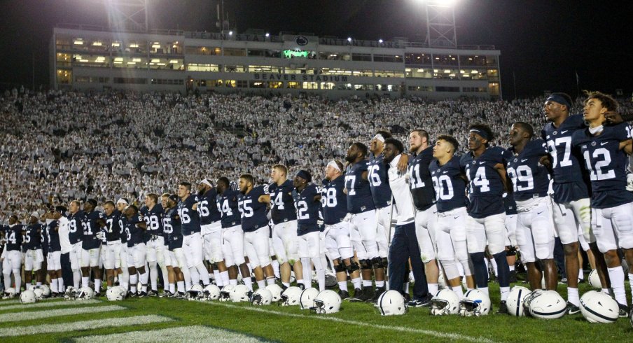 Oct 21, 2017; University Park, PA, USA; Penn State Nittany Lions players sing the alma-mater following the competition of the game against the Michigan Wolverines at Beaver Stadium. Penn State defeated Michigan 42-13. Mandatory Credit: 