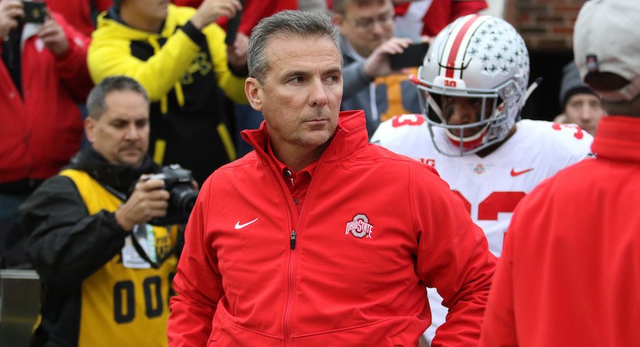 Ohio State falls in the polls after a big loss to Iowa.