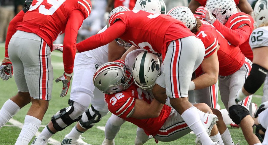 Tuf Borland makes a tackle for Ohio State