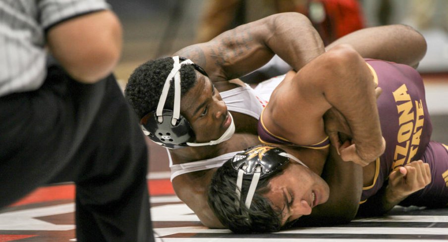 Te'Shan Campbell grinding Anthony Valencia into the mat