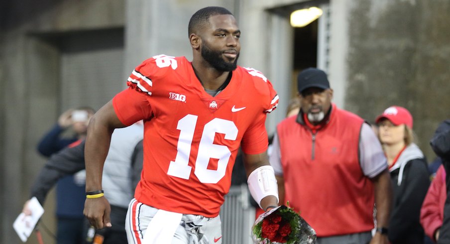 J.T. Barrett takes the field before his final game at Ohio Stadium.