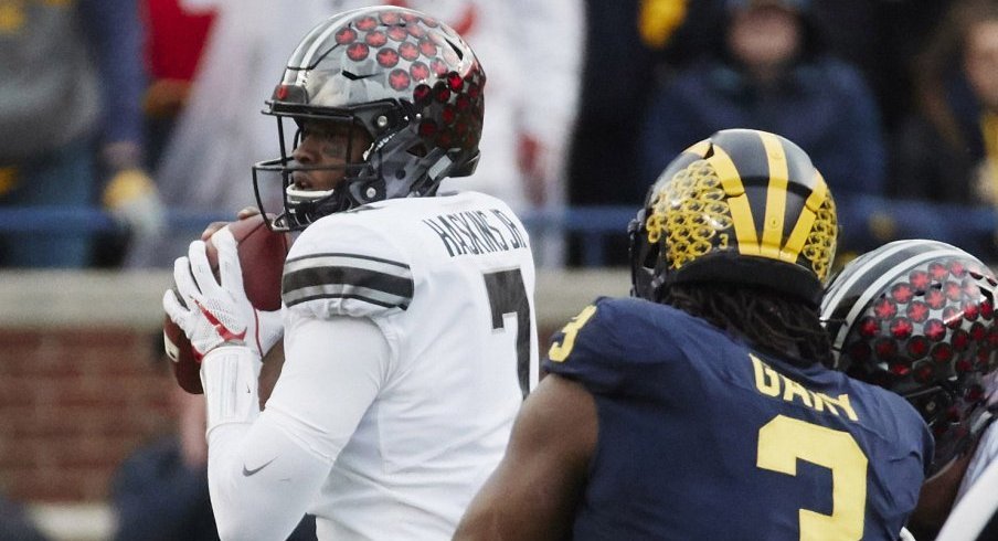 Backup quarterback Dwayne Haskins completed six of seven passes for 94 yards in relief of an injured J.T. Barrett.