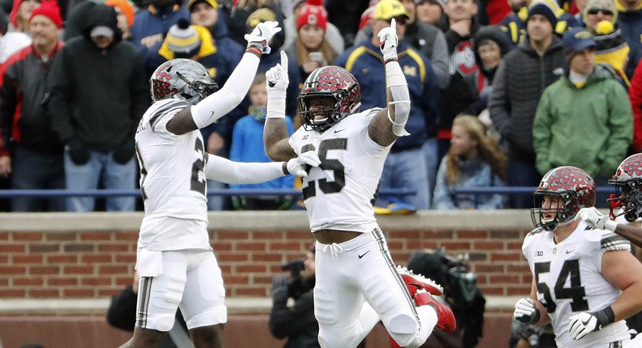 Parris Campbell and Mike Weber celebrate Weber's game-clinching touchdown in Ann Arbor.