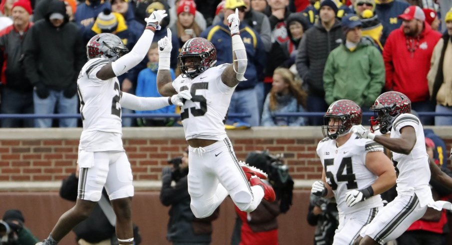 Nov 25, 2017; Ann Arbor, MI, USA; Ohio State Buckeyes running back Mike Weber (25) celebrates with wide receiver Parris Campbell (21) after his touchdown during the second half of Ohio State's 31-20 win over Michigan at Michigan Stadium. Mandatory Credit: Winslow Townson-USA TODAY Sports