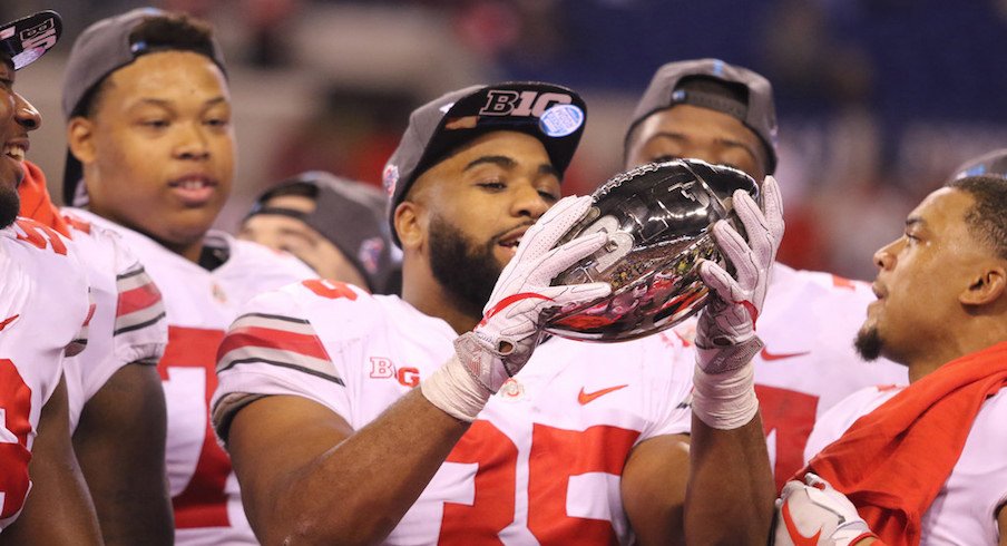 Chris Worley celebrates a Big Ten title.