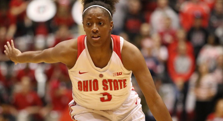 Kelsey Mitchell breaks all-time scoring record.