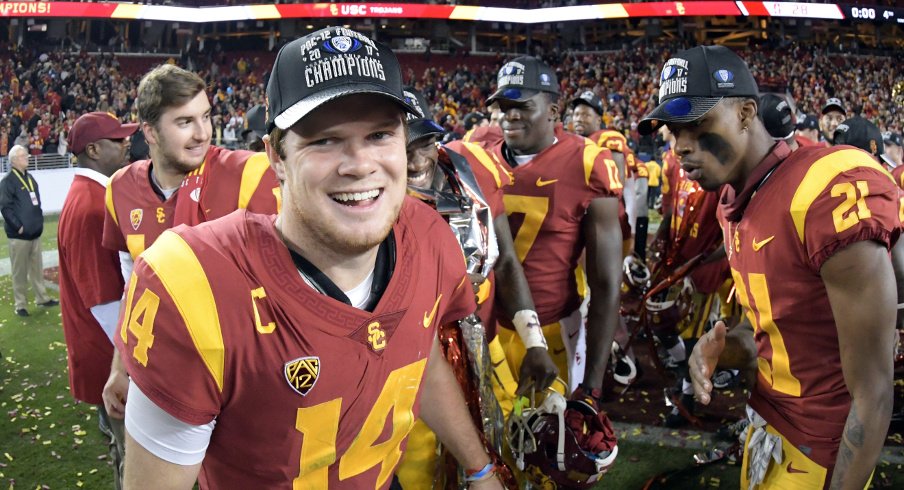 Dec 1, 2017; Santa Clara, CA, USA; Southern California Trojans quarterback Sam Darnold (14) celebrates after the Pac-12 Conference championship game against the Stanford Cardinal at Levi's Stadium. USC defeated Stanford 31-28 Mandatory Credit: Kirby Lee-USA TODAY Sports