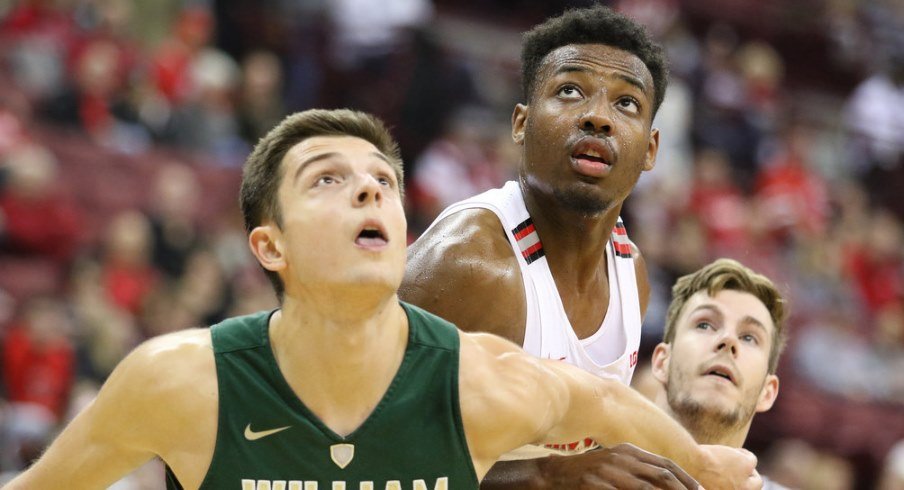 Ohio State basketball player Andre Wesson fights for a rebound