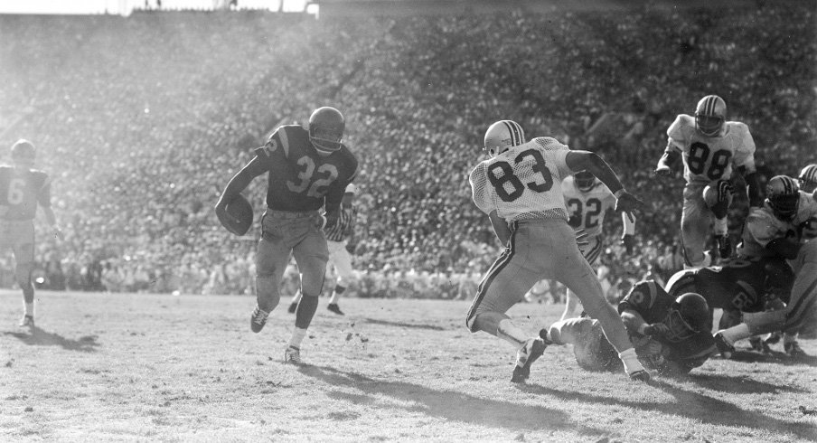 O.J. Simpson runs against Ohio State's defense. (Tournament of Roses)