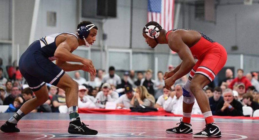 Myles Martin sizes up his opponent.