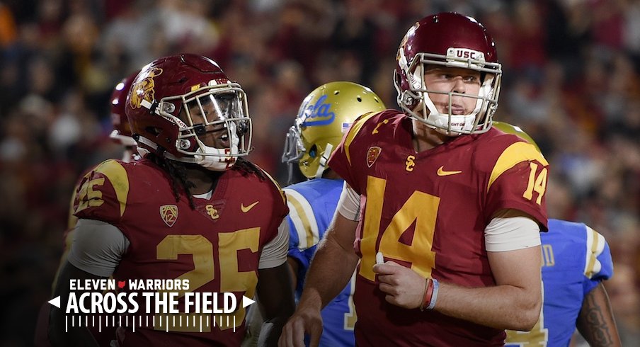 Ronald Jones (25), Sam Darnold (14) and the USC Trojans will face Ohio State in the Cotton Bowl on Friday.