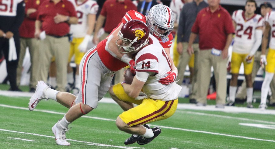 Sam Hubbard sacked Sam Darnold 2.5 times on Friday night.