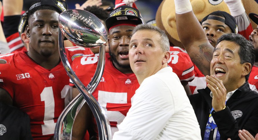 Urban Meyer and the Cotton Bowl Trophy