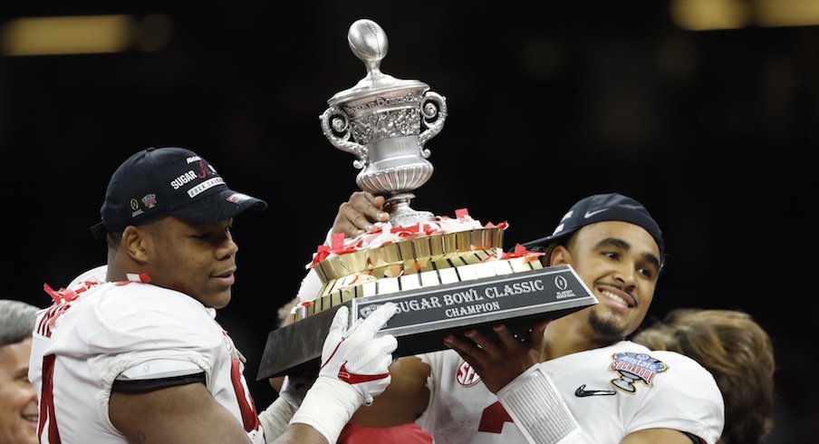 Alabama's Da'Ron Payne and Jalen Hurst celebrate after defeating Clemson in the College Football Playoff semifinal at the Sugar Bowl.