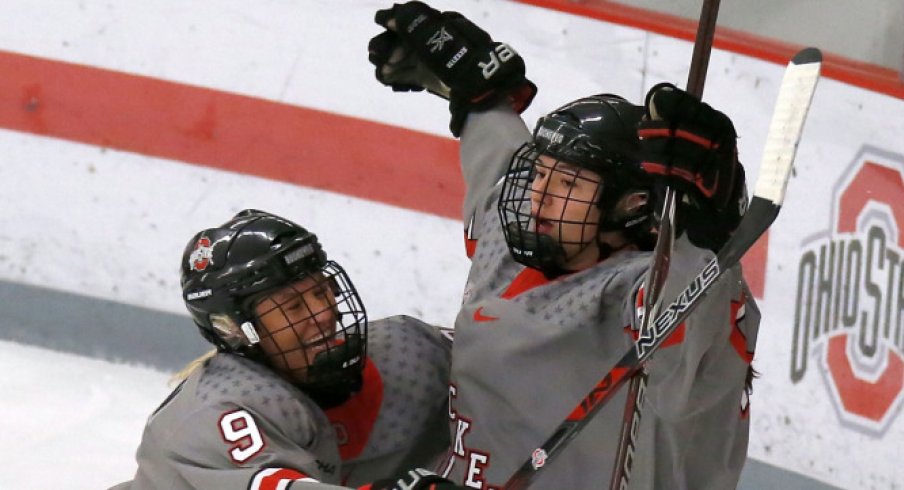 Buckeye freshman Liz Schepers celebrates a goal against Minnesota with Liv Halvorson.