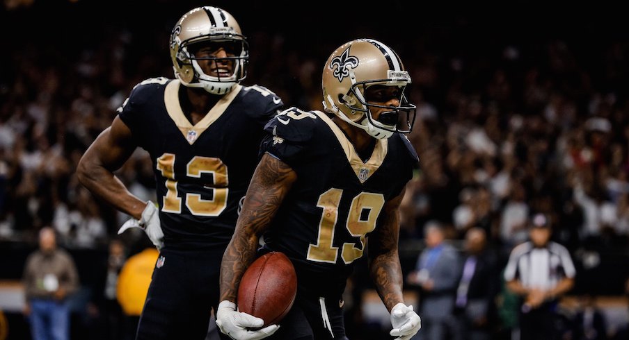 Ted Ginn (19) celebrates with Michael Thomas (13) after scoring a touchdown for the New Orleans Saints this past season.