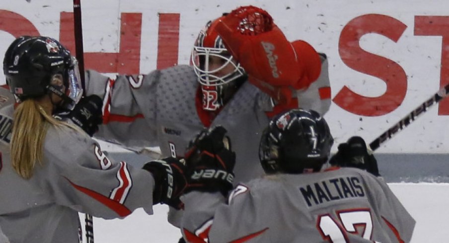 Kassidy Sauve, Emma Maltais, and Dani Sadek celebrate a big Buckeye women's hockey win.