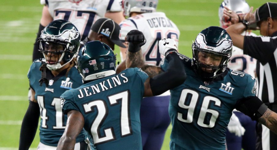 Feb 4, 2018; Minneapolis, MN, USA; Philadelphia Eagles strong safety Malcolm Jenkins (27) celebrates with defensive end Derek Barnett (96) after a hit on New England Patriots wide receiver Brandin Cooks (14) during the second quarter in Super Bowl LII at U.S. Bank Stadium. Mandatory Credit: Charles LeClaire-USA TODAY Sports