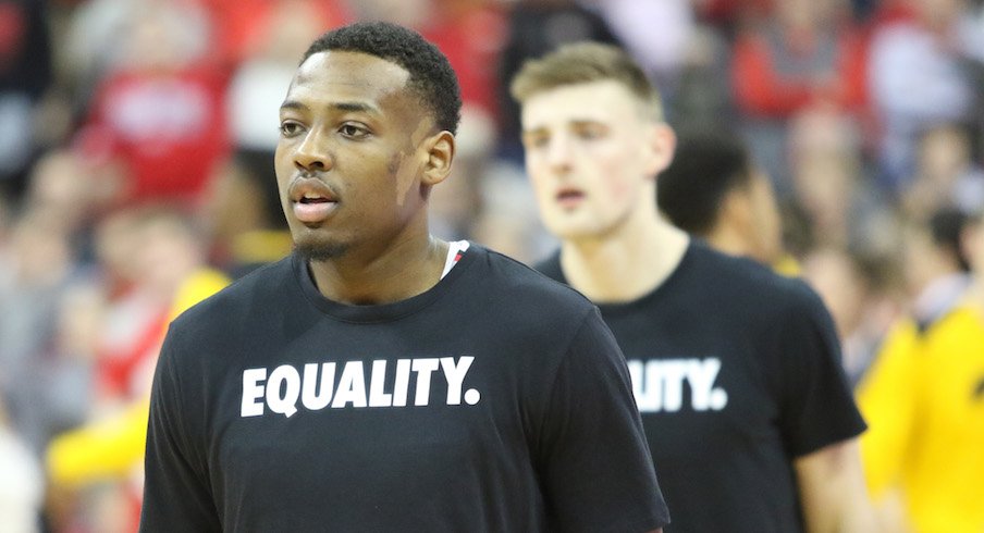 Andre Wesson and Micah Potter wearing "Equality" shirts to recognize Black History Month before Saturday's game against Iowa.