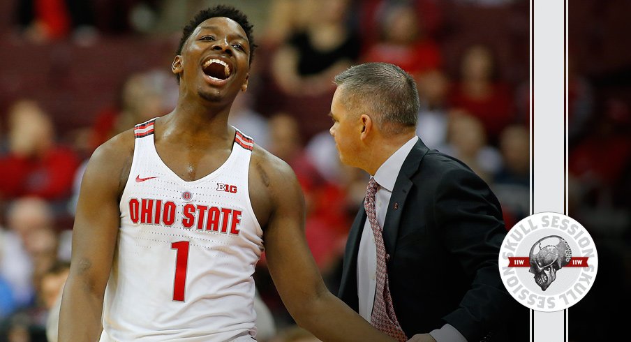 Jae'Sean Tate and Chris Holtmann celebrate the February 21st 2018 Skull Session