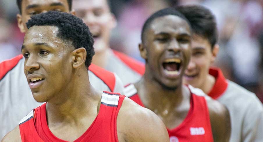 Ohio State's C.J. Jackson and Kam Williams celebrate their team's double overtime win at Indiana Friday night.