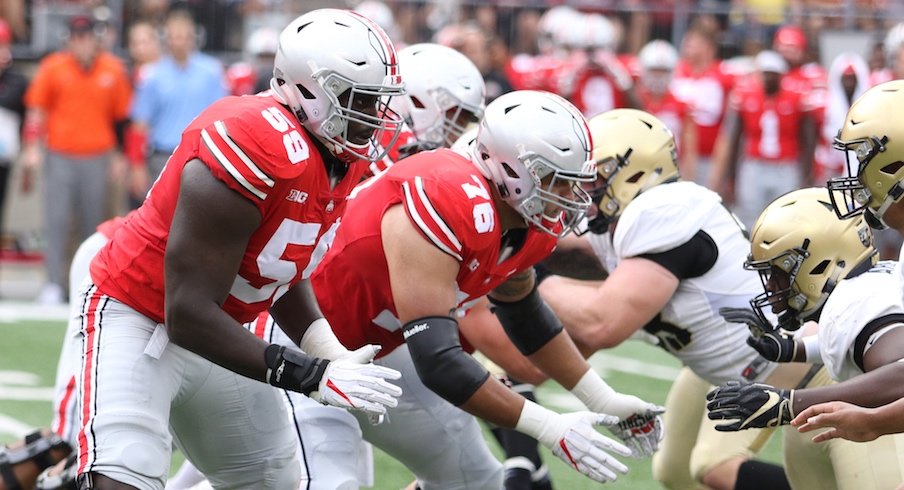 Isaiah Prince (59) and Branden Bowen (76) are among Ohio State's returning starters on its offensive line.