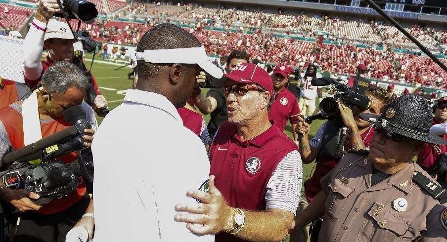 Future Florida State head coach Willie Taggart and former Florida State head coach Jimbo Fisher