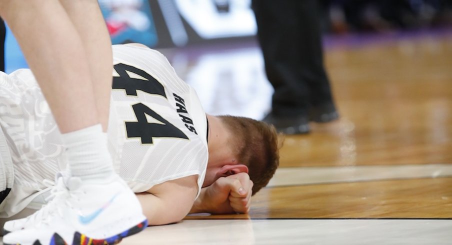 Mar 16, 2018; Detroit, MI, USA; Purdue Boilermakers center Isaac Haas (44) lays on the ground after an injury in the second half against the Cal State Fullerton Titans in the first round of the 2018 NCAA Tournament at Little Caesars Arena. Mandatory Credit: Rick Osentoski-USA TODAY Sports
