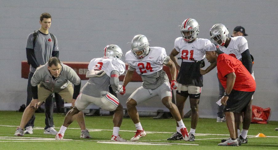 Kendall Sheffield (8) and Shaun Wade (24) compete during a drill in practice.