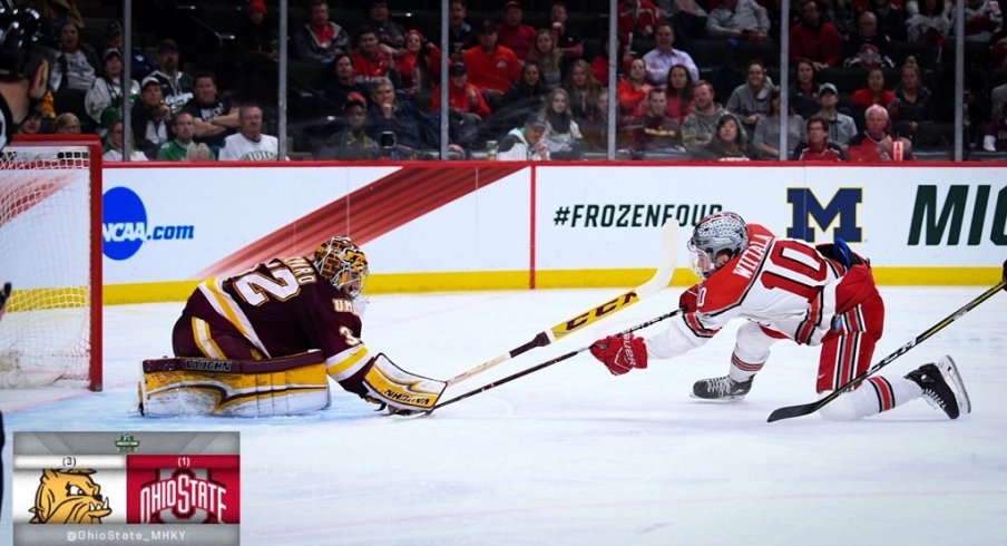 Ohio State forward John Wiitala takes the puck to the net against Minnesota-Duluth goalie Hunter Shepard.