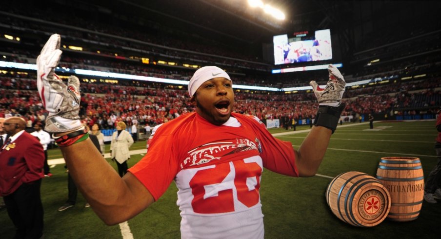 Dec 2, 2017; Indianapolis, IN, USA;Ohio State Buckeyes running back Antonio Williams (26) celebrates their win against the Wisconsin Badgers, 27-21 in the Big Ten championship game at Lucas Oil Stadium. Mandatory Credit: Thomas J. Russo-USA TODAY Sports