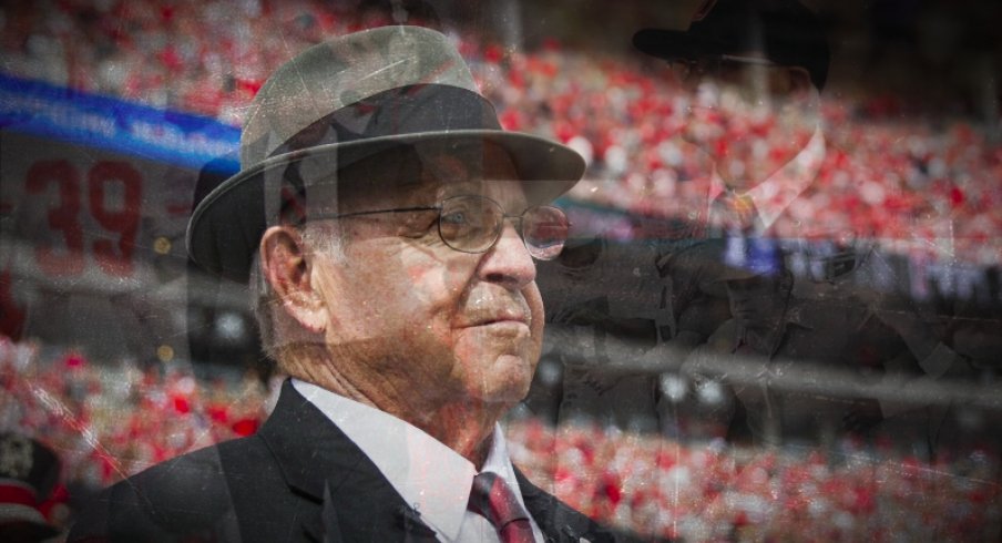 Oct 1, 2016; Columbus, OH, USA; Former Ohio State Buckeyes head coach Earle Bruce awaits on the sidelines for his chance to dot the "I" during the marching band's Script Ohio performance before the game against the Rutgers Scarlet Knights at Ohio Stadium. Ohio State won the game 58-0. Mandatory Credit: Greg Bartram-USA TODAY Sports