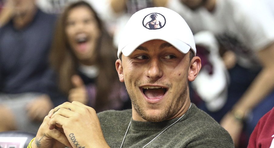 Mar 4, 2017; College Station, TX, USA; Former Texas A&M Aggies quarterback and 2012 Heisman Trophy winner Johnny Manziel watches a game against the Kentucky Wildcats at Reed Arena. Mandatory Credit: Troy Taormina-USA TODAY Sports