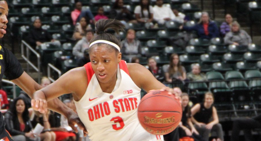 Kelsey Mitchell drives against Maryland in a Big Ten tournament game