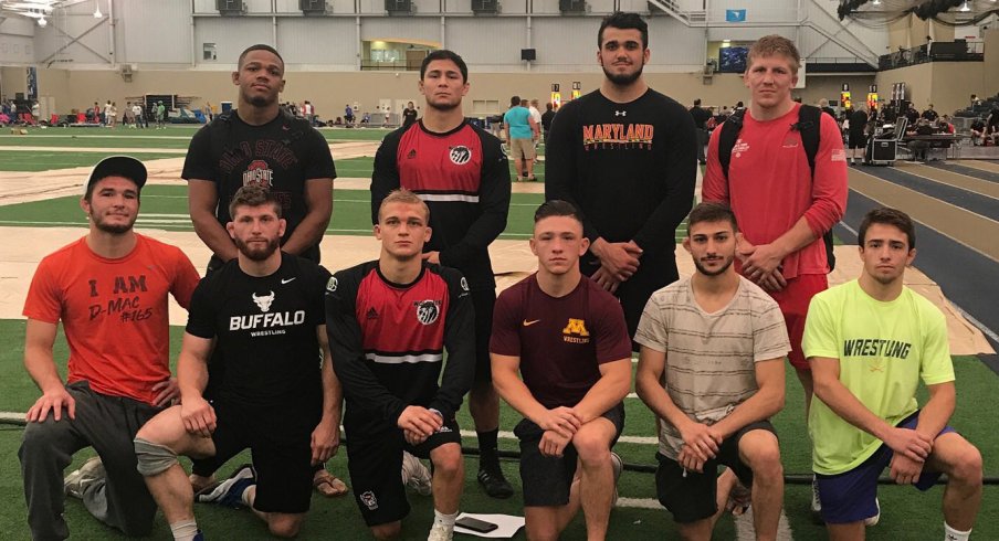 Myles Martin (back left) and Kollin Moore (back right) anchor the U23 Freestyle World Team.