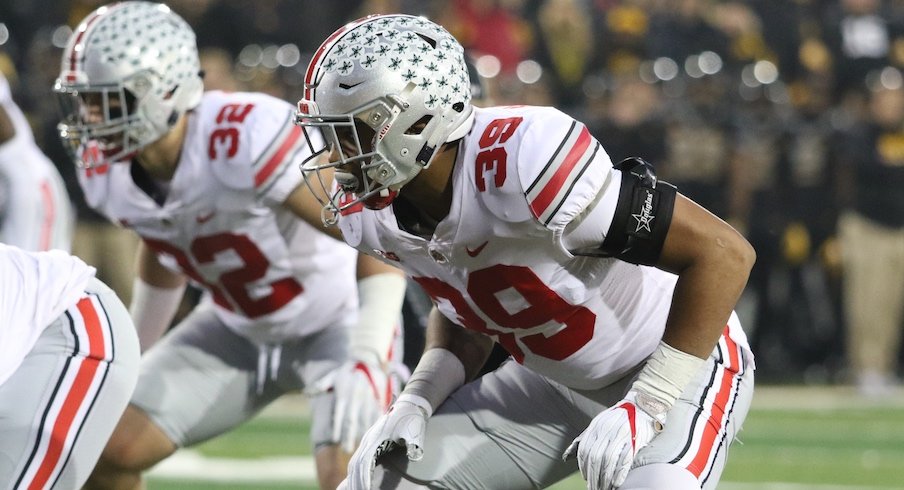 Tuf Borland (32) and Malik Harrison (39)