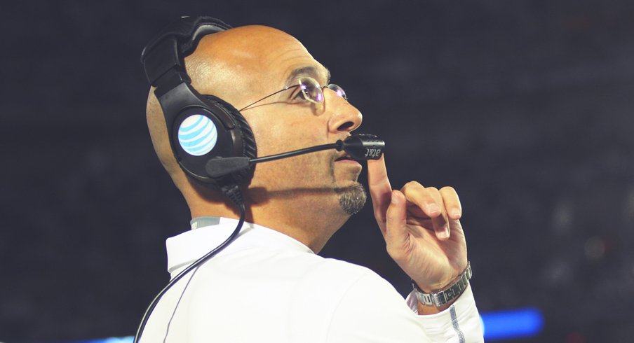 James Franklin ponders a beer.