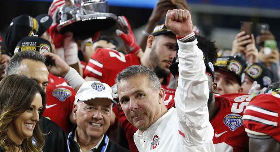 Urban Meyer celebrates his team's Cotton Bowl win over USC.