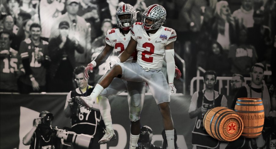 December 31, 2016; Glendale, AZ, USA; Ohio State Buckeyes safety Malik Hooker (24) celebrates with cornerback Marshon Lattimore (2) after intercepting pass against the Clemson Tigers during the first half of the the 2016 CFP semifinal at University of Phoenix Stadium. Mandatory Credit: Matthew Emmons-USA TODAY Sports