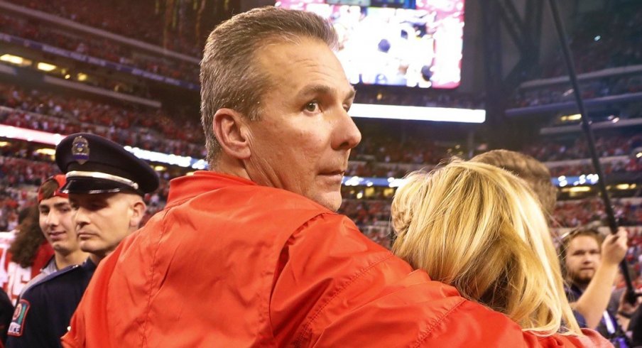 Dec 2, 2017; Indianapolis, IN, USA; Ohio State Buckeyes coach Urban Meyer with his wife Shelley after winning against the Wisconsin Badgers in the Big Ten championship game at Lucas Oil Stadium. Mandatory Credit: Brian Spurlock-USA TODAY Sports